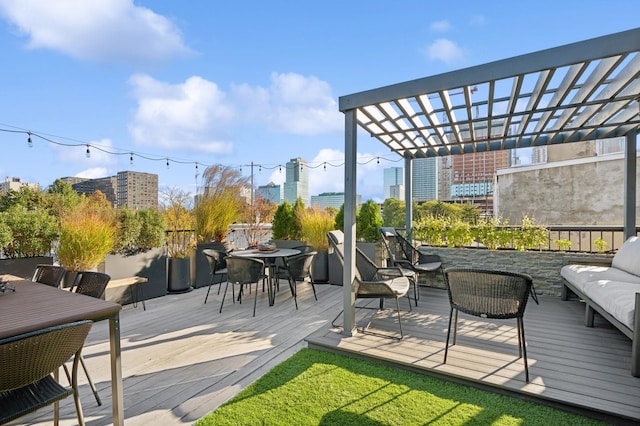 wooden deck featuring outdoor lounge area and a pergola