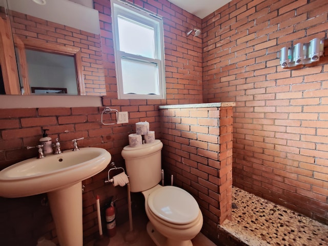 bathroom with walk in shower and toilet