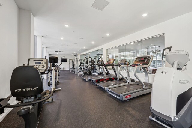 exercise room featuring recessed lighting