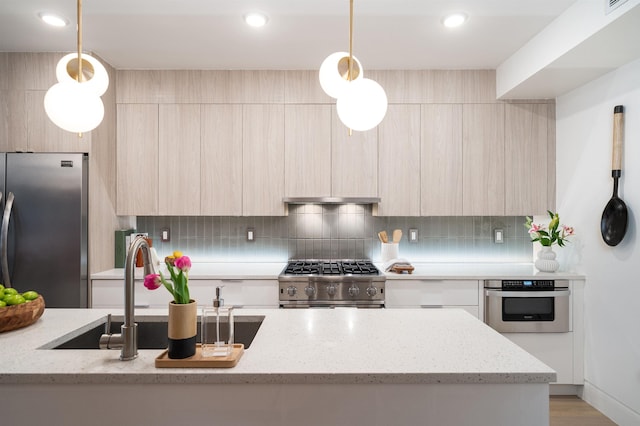 415 Monmouth St Apt. Three, Apt Three, Jersey City, NJ 07302 - kitchen with modern cabinets, stainless steel appliances, light brown cabinetry, decorative backsplash, and recessed lighting