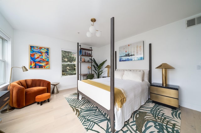 415 Monmouth St Apt. Three, Apt Three, Jersey City, NJ 07302 - bedroom with wood finished floors and multiple windows