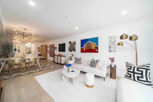 415 Monmouth St Apt. Three, Apt Three, Jersey City, NJ 07302 - living area with a chandelier, light wood-type flooring, and recessed lighting