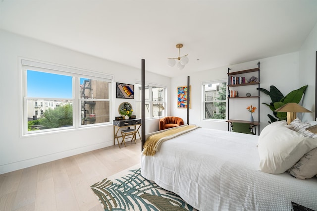 415 Monmouth St Apt. Three, Apt Three, Jersey City, NJ 07302 - bedroom with multiple windows and wood finished floors