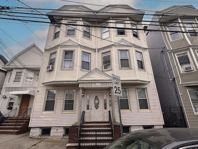 view of front of property featuring cooling unit