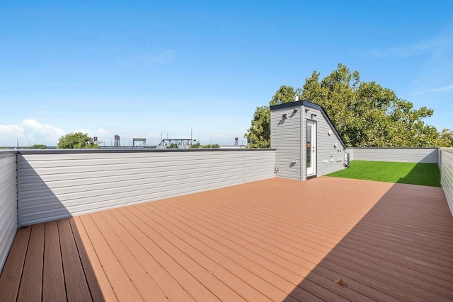 wooden deck featuring an outdoor structure