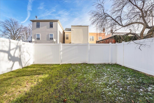 view of yard featuring a fenced backyard
