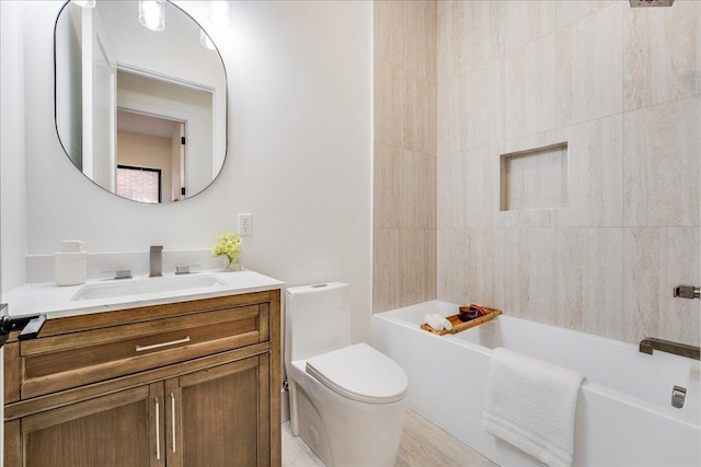 full bathroom featuring vanity, toilet, and washtub / shower combination