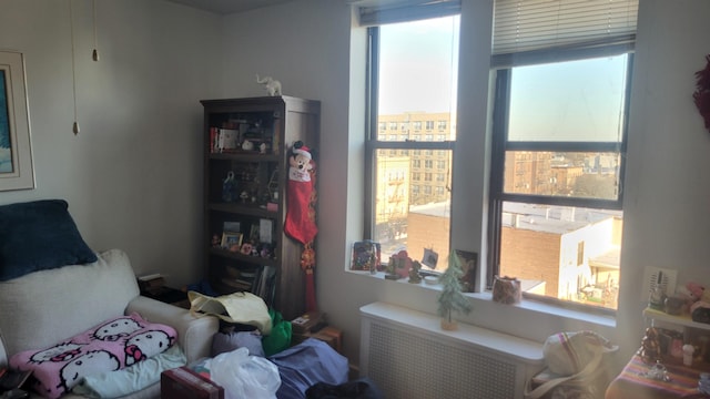 bedroom featuring radiator heating unit