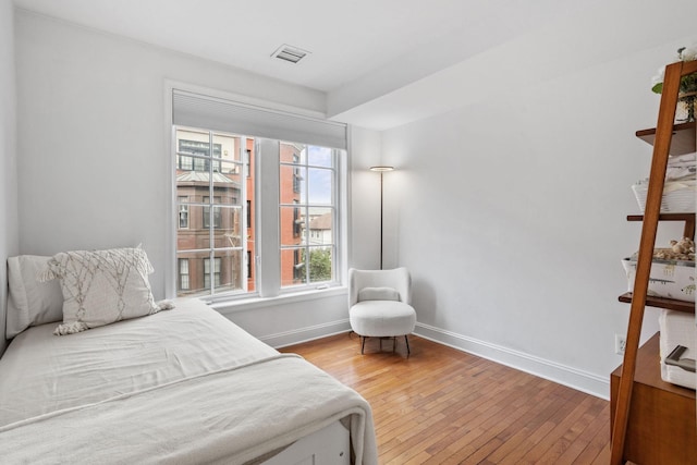 501 9th St Unit 407, Hoboken, NJ 07030 - bedroom with hardwood / wood-style flooring and baseboards