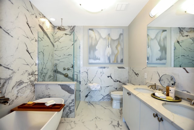 full bathroom with vanity, separate shower and tub, toilet, and tile walls