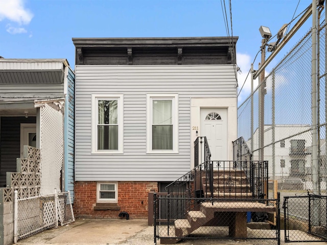 211 Plainfield Ave, Jersey City, NJ 07306 - rear view of house featuring a gate