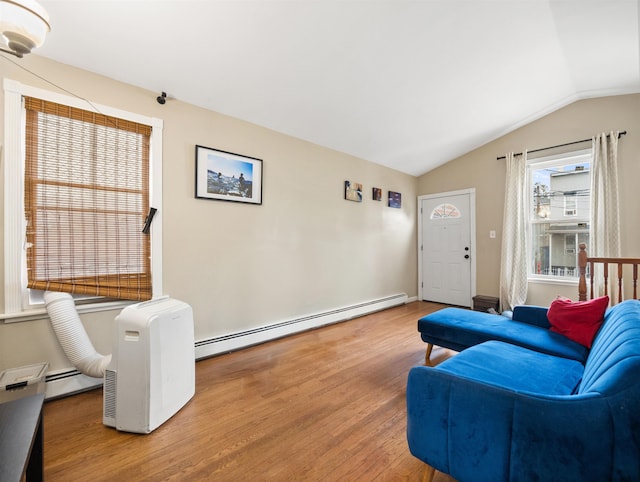 211 Plainfield Ave, Jersey City, NJ 07306 - living area featuring baseboard heating, wood finished floors, and vaulted ceiling