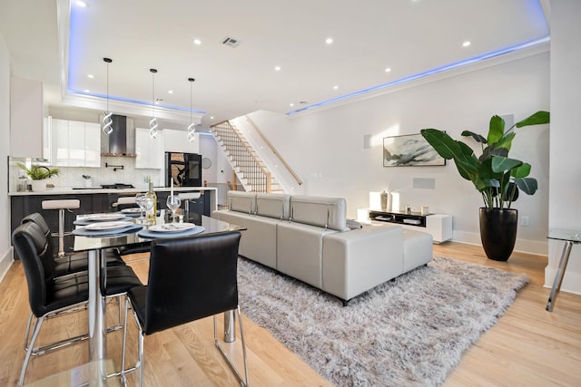 93 Terrace Ave Unit 2, Jersey City, NJ 07037 - living area featuring light wood-type flooring, stairs, and recessed lighting