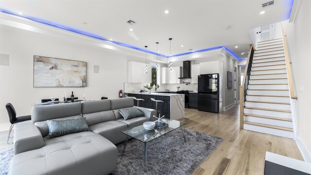 93 Terrace Ave Unit 2, Jersey City, NJ 07037 - living room with stairs, light wood-style flooring, recessed lighting, and electric panel