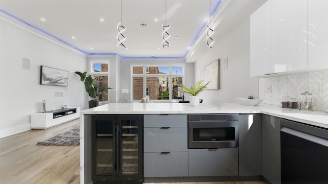93 Terrace Ave Unit 2, Jersey City, NJ 07037 - kitchen featuring beverage cooler, dishwasher, modern cabinets, a peninsula, and light stone counters
