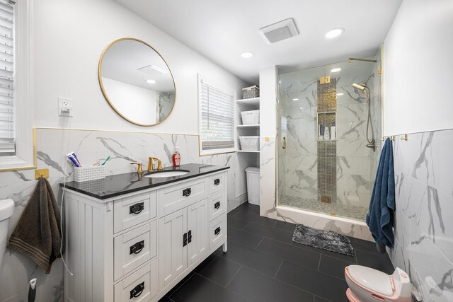 120 Main St, Ridgefield Park, NJ 07660 - full bathroom with toilet, tile walls, a marble finish shower, vanity, and wainscoting