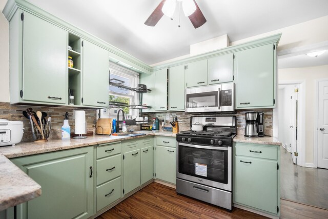 120 Main St, Ridgefield Park, NJ 07660 - kitchen featuring stainless steel appliances, a sink, and tasteful backsplash