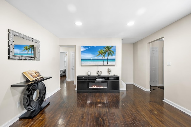 120 Main St, Ridgefield Park, NJ 07660 - living area featuring hardwood / wood-style floors, baseboards, recessed lighting, and a glass covered fireplace
