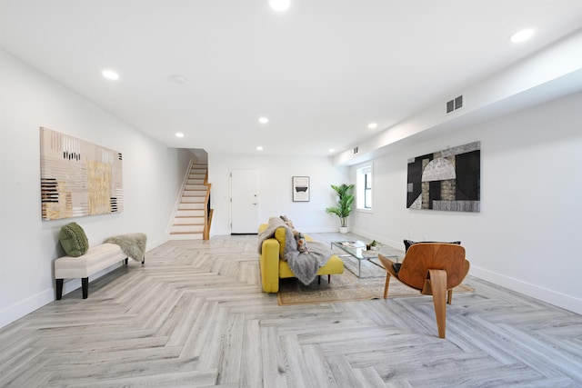 77 Clerk St Unit 1, Jersey City, NJ 07305 - living area featuring stairway, visible vents, recessed lighting, and baseboards