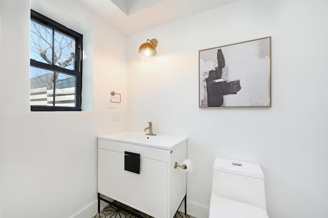 77 Clerk St Unit 1, Jersey City, NJ 07305 - half bathroom with baseboards, vanity, and toilet