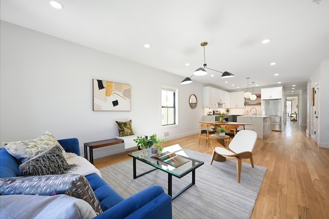 77 Clerk St Unit 1, Jersey City, NJ 07305 - living room featuring recessed lighting, light wood-style flooring, visible vents, and baseboards