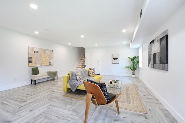 77 Clerk St Unit 1, Jersey City, NJ 07305 - living room featuring baseboards, stairway, and recessed lighting