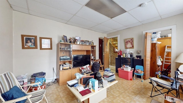 office space featuring a paneled ceiling