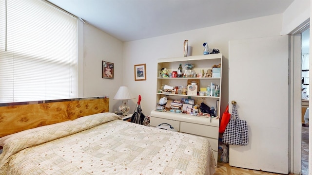 bedroom featuring light hardwood / wood-style flooring