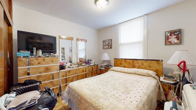 bedroom featuring hardwood / wood-style floors