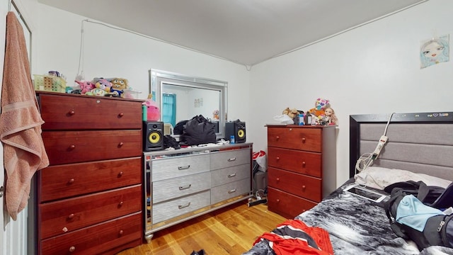 bedroom with light wood-type flooring