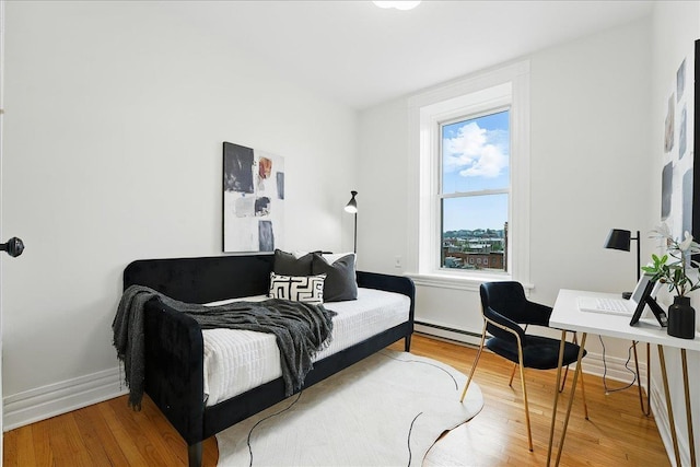 821 Washington St Unit 5, Hoboken, NJ 07030 - home office featuring wood finished floors and a baseboard radiator