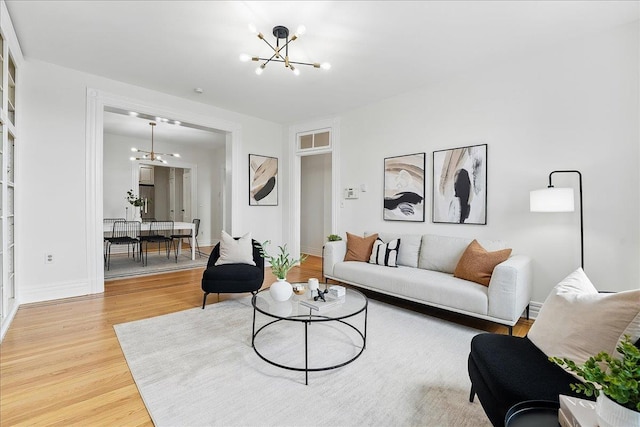 821 Washington St Unit 5, Hoboken, NJ 07030 - living area with a chandelier and light wood finished floors