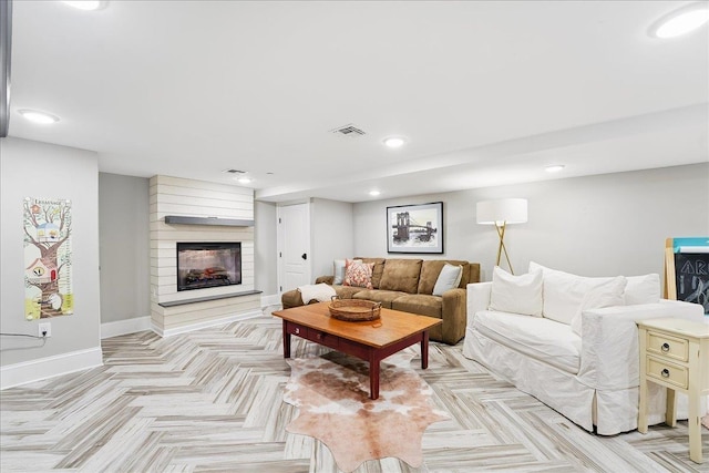324 Hudson St # 1, Hoboken, NJ 07030 - living area with baseboards, a multi sided fireplace, and recessed lighting