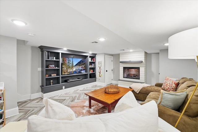 324 Hudson St # 1, Hoboken, NJ 07030 - living area featuring a fireplace, baseboards, recessed lighting, and built in features