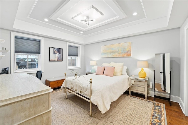 324 Hudson St # 1, Hoboken, NJ 07030 - bedroom with a tray ceiling, recessed lighting, and wood finished floors