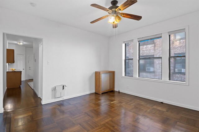 179 Manhattan Ave Unit 3B, Jersey City, NJ 07307 - empty room featuring a ceiling fan, baseboards, and a smoke detector