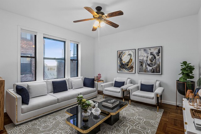 179 Manhattan Ave Unit 3B, Jersey City, NJ 07307 - living area featuring a ceiling fan and baseboards