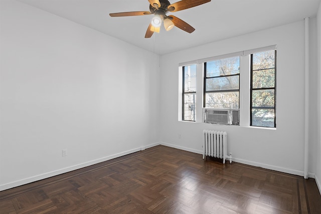 179 Manhattan Ave Unit 3B, Jersey City, NJ 07307 - spare room with radiator, baseboards, and a ceiling fan