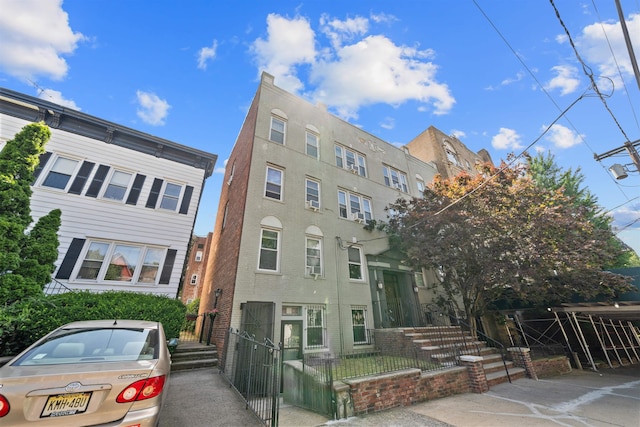 101 Kensington Ave Unit A1, Jersey City, NJ 07304 - view of front of property featuring a fenced front yard and a gate
