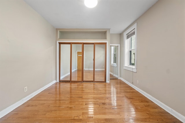 101 Kensington Ave Unit A1, Jersey City, NJ 07304 - unfurnished bedroom with light wood-style floors and baseboards