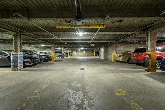 135 38th St Unit 407, Union City, NJ 07087 - parking deck featuring a garage door opener