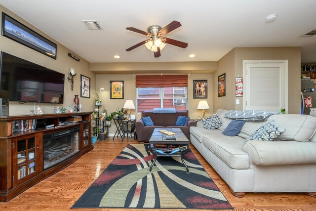 135 38th St Unit 407, Union City, NJ 07087 - living room with visible vents, wood finished floors, ceiling fan, and recessed lighting