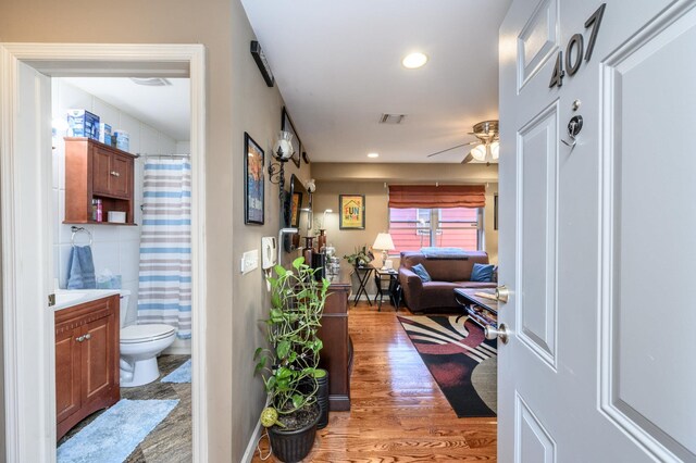 135 38th St Unit 407, Union City, NJ 07087 - hallway featuring recessed lighting, light wood finished floors, and visible vents