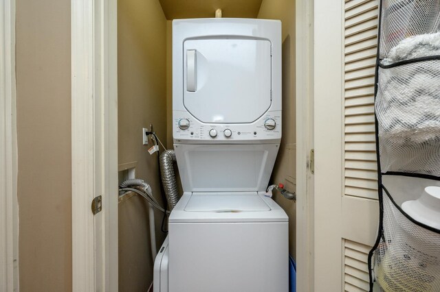 135 38th St Unit 407, Union City, NJ 07087 - laundry room with stacked washer / dryer and laundry area
