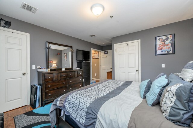 135 38th St Unit 407, Union City, NJ 07087 - bedroom with visible vents and wood finished floors