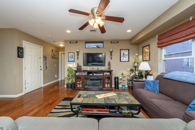 135 38th St Unit 407, Union City, NJ 07087 - living area with baseboards, wood finished floors, ceiling fan, and recessed lighting