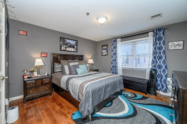 135 38th St Unit 407, Union City, NJ 07087 - bedroom featuring wood finished floors, baseboards, and visible vents