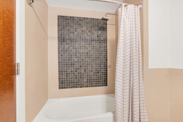 601 Observer Hwy Unit 204, Hoboken, NJ 07030 - bathroom featuring shower / bath combo with shower curtain