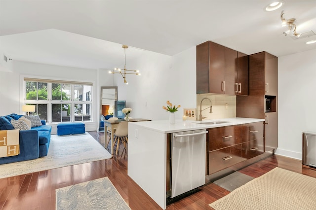 601 Observer Hwy Unit 204, Hoboken, NJ 07030 - kitchen featuring dishwasher, a sink, open floor plan, light countertops, and a chandelier