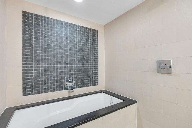 601 Observer Hwy Unit 204, Hoboken, NJ 07030 - full bathroom with tile walls and a bath